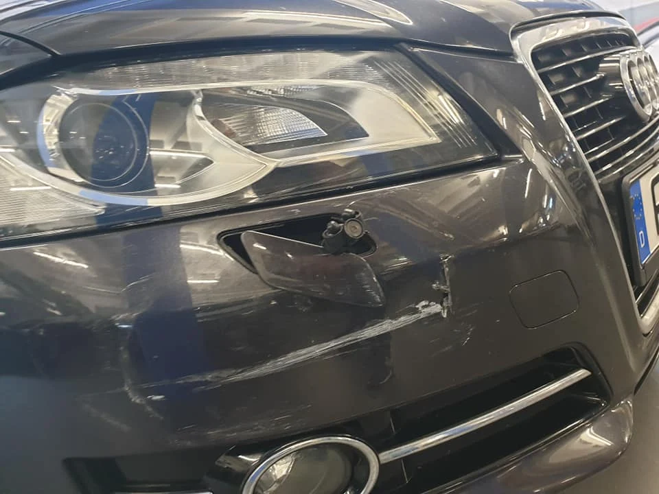 Begutachtung eines Audi mit Karosserieschaden